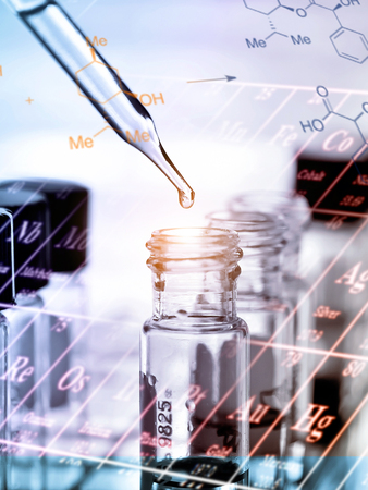 Dropping Chemical liquid to test tubesの写真素材