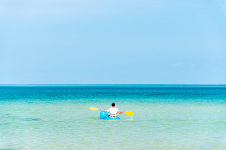 tropical beach and sea with blue sky, vacation conceptの写真素材