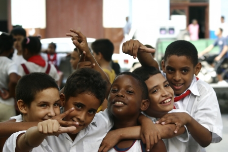 CUBA - OCTOBER 18  Cuban children play on one of the streets of Havana  October 18, 2005 in Cuba  Red ties are characteristic feature of Pioneers in Communist countries のeditorial素材