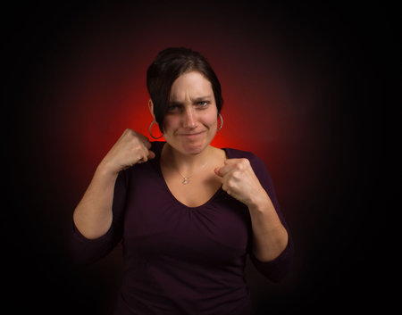 Irritated and moody female model, boxingの写真素材