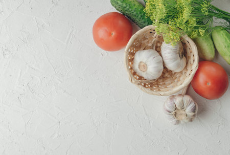 Cooking healthy diet or vegetarian food. Healthy eating. Ingredients for salad. flat lay. Tomatoes, cucumbers and dill for a vegan salad. Spring. food .The concept of proper nutritionの写真素材