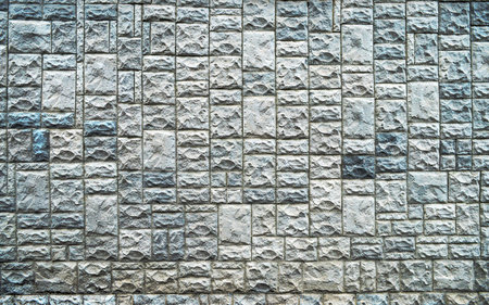 Texture of a stone wall. Old castle stone wall texture background. Stone wall as a background or...