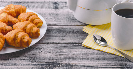 breakfast with croissant, Chocolate croissant. Croissant with chocolate filling. Sliced...