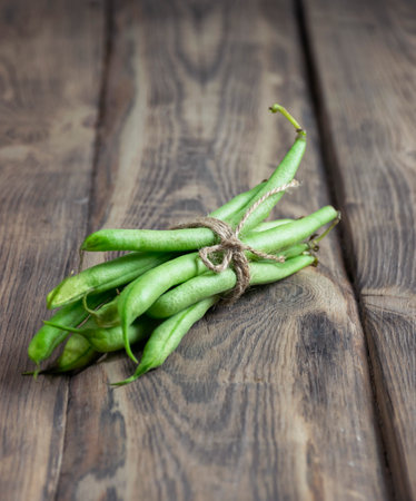 green beans. High fiber fresh green vegetables. Healthy vegan diet food high in antioxidants, smart carbs, vitamins, minerals. Sustainable, save the planet, eco friendly, go green concept. Top viewの写真素材