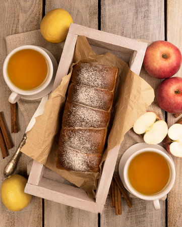 Sweet Autumn Apple Pie and Pastries on a Table, Creating a Perfect Setting for a Tea Party and Autumnal Mood. Top viewの写真素材