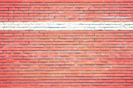 A brick wall is a sturdy structure made of bricks and mortar. It provides privacy, security, and aesthetic appeal to buildings. durability and timeless look. indoors or outdoors, a brick wallの写真素材