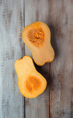Big red pumpkin background, copy space, Orange  pumpkin , close-up.Pumpkin .Cooking seasonal food from pumpkin. Delicious healthy food.Autumn.Winter. Vitamins.の写真素材