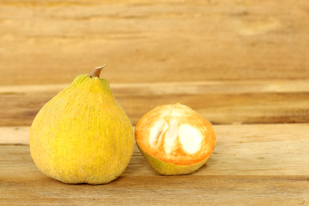 sentul fruit isolated on wood backgroundの写真素材