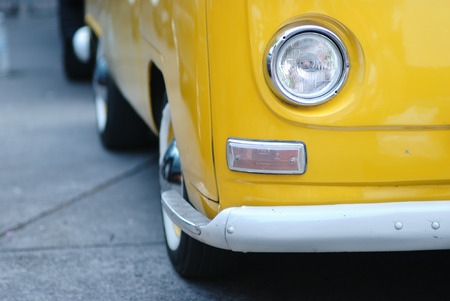 Yellow bus with one headlightのeditorial素材