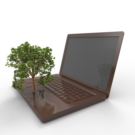  3d illustration of a tree growing on a laptopの写真素材