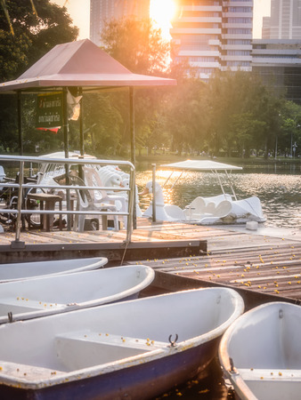 Park in the evening light. The large lagoons, fountains and many types of boats.の写真素材