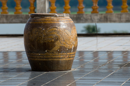 Old glazed water jar with dragon vases thai lifestyleの写真素材