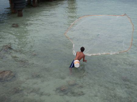 fishing man phuket thailand