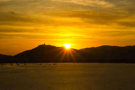 the beautiful sunset in phuket thailandの写真素材