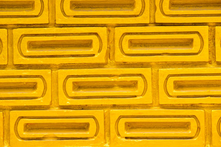 Beautiful gold brick wall. Commercial background.の写真素材