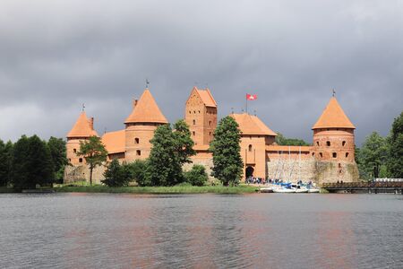 LITHUANIA, VILNIUS COUNTY, TRAKAI - JULY 03, 2018: Beautiful situated is Trakai Island Castle in the Lake Galv ?.のeditorial素材