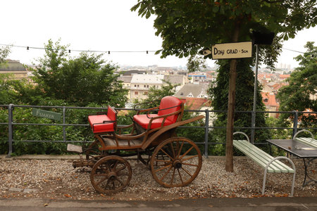 CROATIA, ZAGREB, GRADEC - JULY 28, 2019: A carriage and a signpost to Donji Grad stands as...
