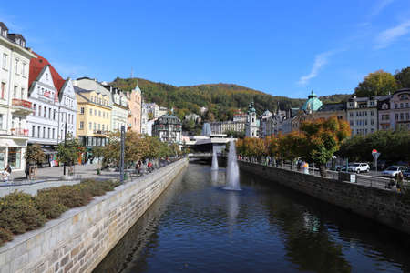 CZECH REPUBLIC, KARLOVY VARY, DIVADELNI NAM. - STARA LOUKA - OCTOBER 04, 2018: View on River Tepla, Hot Spring Colonnade and Church of Saint Mary Magdalene.のeditorial素材