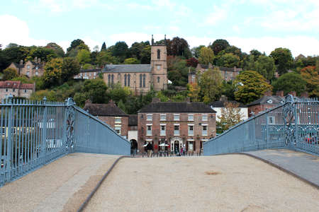 ENGLAND, WEST MIDLANDS, SHROPSHIRE, IRONBRIDGE, OCTOBER 14, 2015: View from the world's first cast iron bridge to the town center of Ironbridgeのeditorial素材