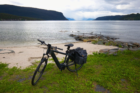 E-bike on the shores of the Hardangerfjord in Norway.の写真素材