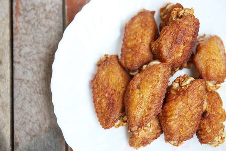 Chicken fried on white dish.の写真素材