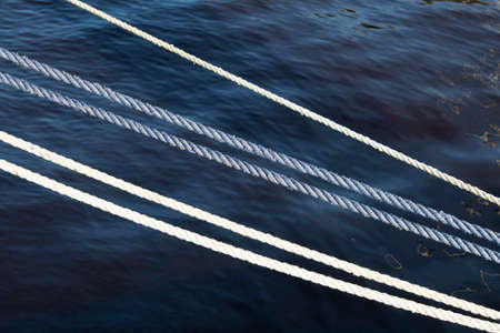 ropes above waterの写真素材