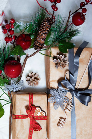 red and green christmas decorations with vintage gift box on white backgroundの写真素材