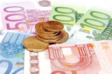 Euro banknotes and coinsの写真素材