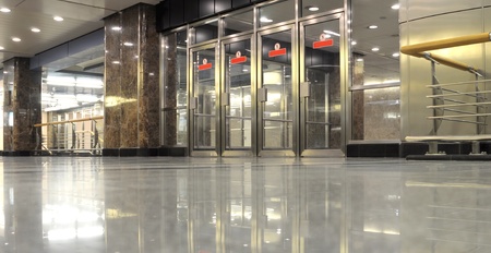 Glass and metal doors in undegrond hallのeditorial素材