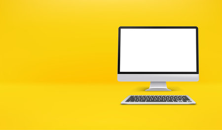 Modern computer with blank screen on yellow interior. Horizontal banner with copy space