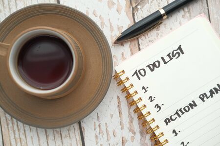 top view of to do list and tea on tableの写真素材