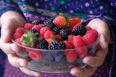 close up of fresh berry fruit in a bowlの写真素材