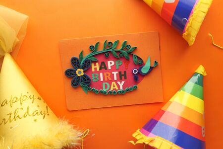 birthday card and ballon on orange background.の写真素材