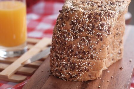 Close up of bread and juice on table .の写真素材