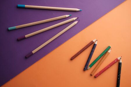 Close up of many colorful pencils on color background. の写真素材