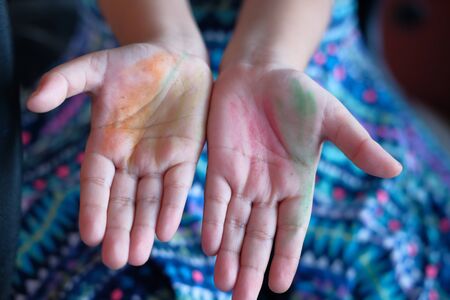 Close up of child girl hand with colorの写真素材