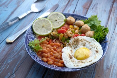 keto diet concept with egg and vegetable on plate .の写真素材