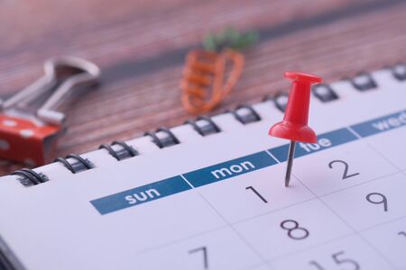 deadline concept with pin on calendar date, close up.の写真素材