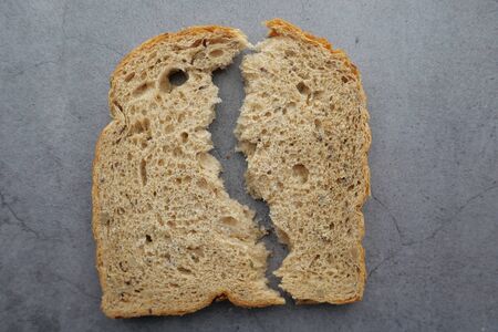 close up of slice of bread on table.の写真素材