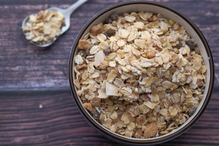 top view of fresh oats in a bowl for morning breakfast.