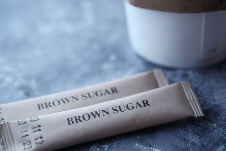 Close up of brown sugar and coffee on tableの写真素材