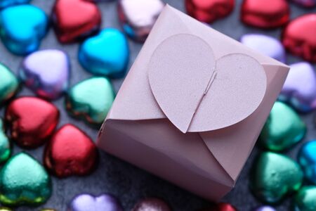 top view of heart shape candy in a gift box on table, valentine dayの写真素材
