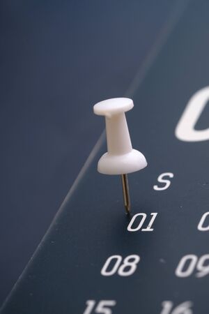 deadline concept with push pin on calendar dateの写真素材