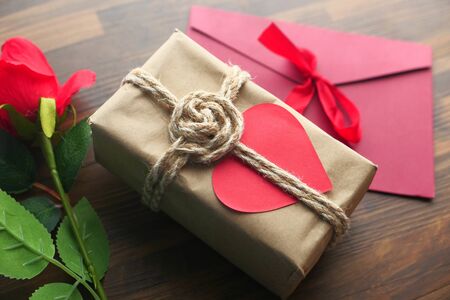 Close up of valentine day gift box and envelope on table.の写真素材