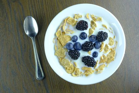 top view of berry food on oats in a bowl.の写真素材