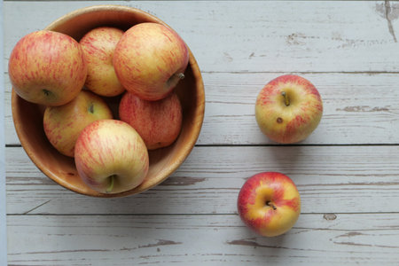 Close up of slice of apple on shopping board