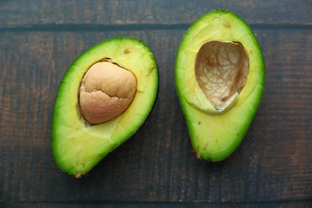 Close up of fresh avocado on tableの写真素材