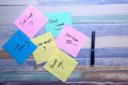 top view new year goals written on sticky notes on table.の写真素材