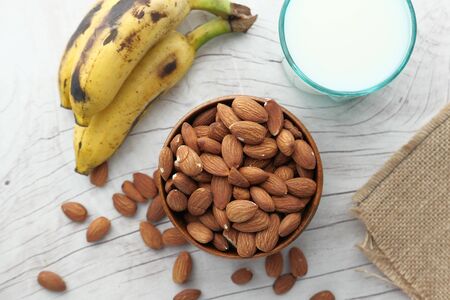 almond, milk and banana for breakfast, top viewの写真素材