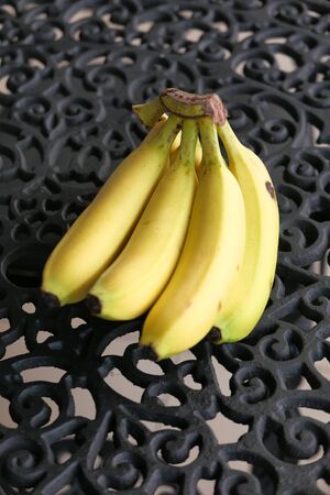 Banana on the wooden background. Top view.の写真素材